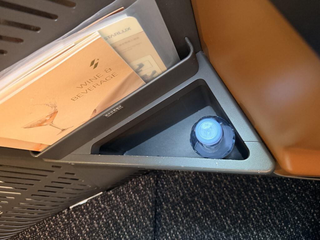 STARLUX A350 Storage compartment next to footrest and ottoman